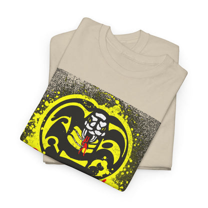Neatly folded Cobra Kai T-shirt in soft beige, displaying the striking Cobra emblem, a perfect gift for fans of the martial arts series.