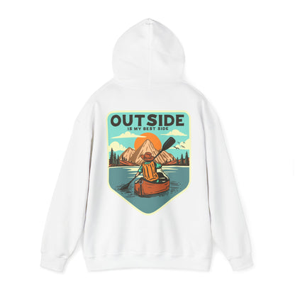 Admire the pristine white retro back print hoodie displaying an artistic depiction of a kayaker on a serene lake with mountains at sunrise, highlighted by the phrase 'OUTSIDE IS MY BEST SIDE'.
