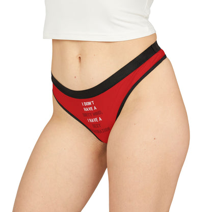 Stylish women's thong worn on a model, elegantly displaying the cheeky text design, perfect for adding a touch of humour to intimate wear.