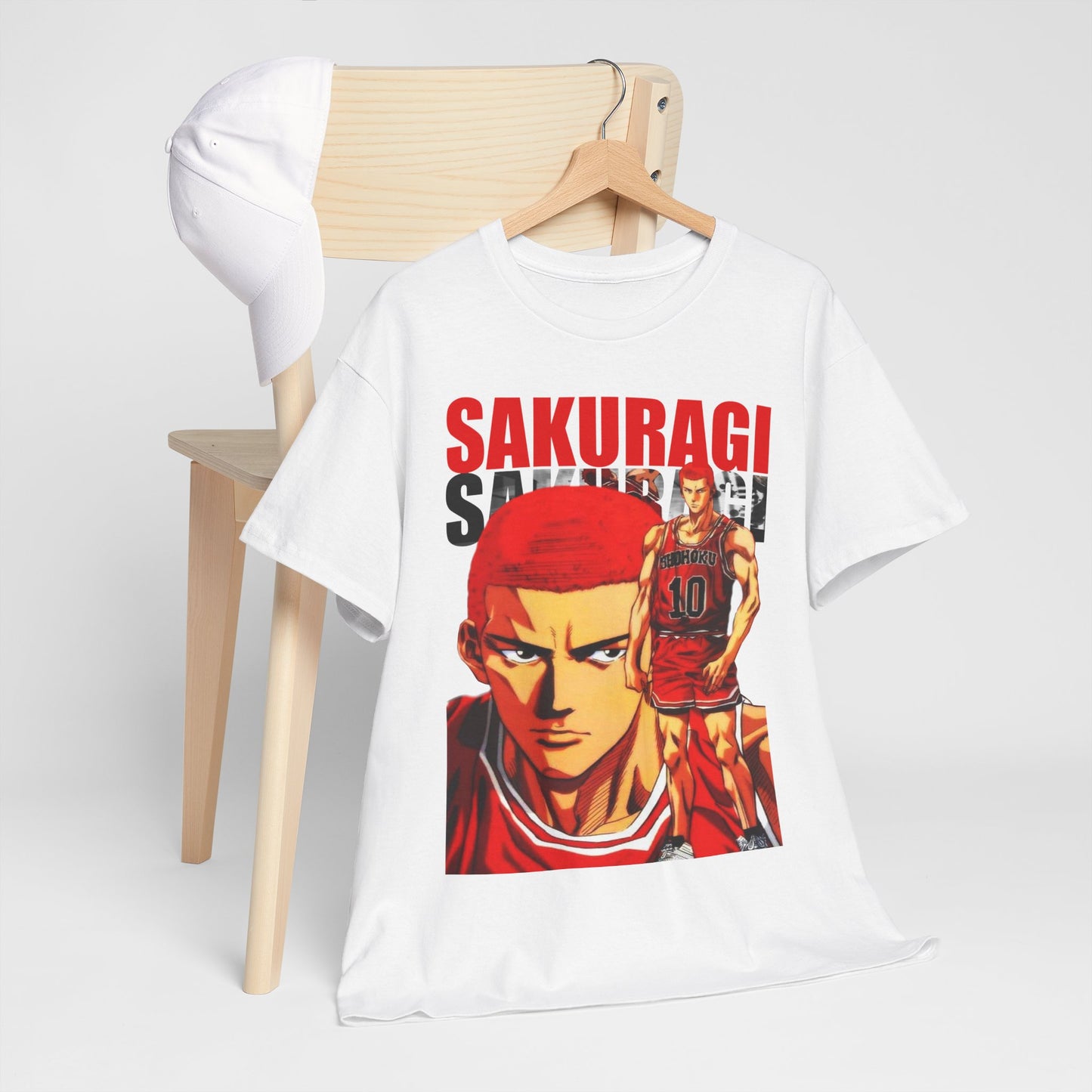 Luxury white t-shirt featuring a striking anime-inspired design of Sakuragi from Slam Dunk, hanging elegantly on a wooden hanger with a stylish baseball cap, perfect for fashion-forward anime enthusiasts.