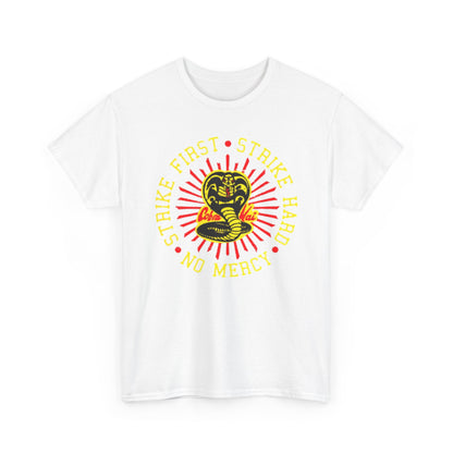 Elegant white t-shirt featuring a bold Cobra Kai graphic, illustrating the powerful snake emblem and the inspiring mantra 'Strike First, Strike Hard, No Mercy', perfect for martial arts enthusiasts.