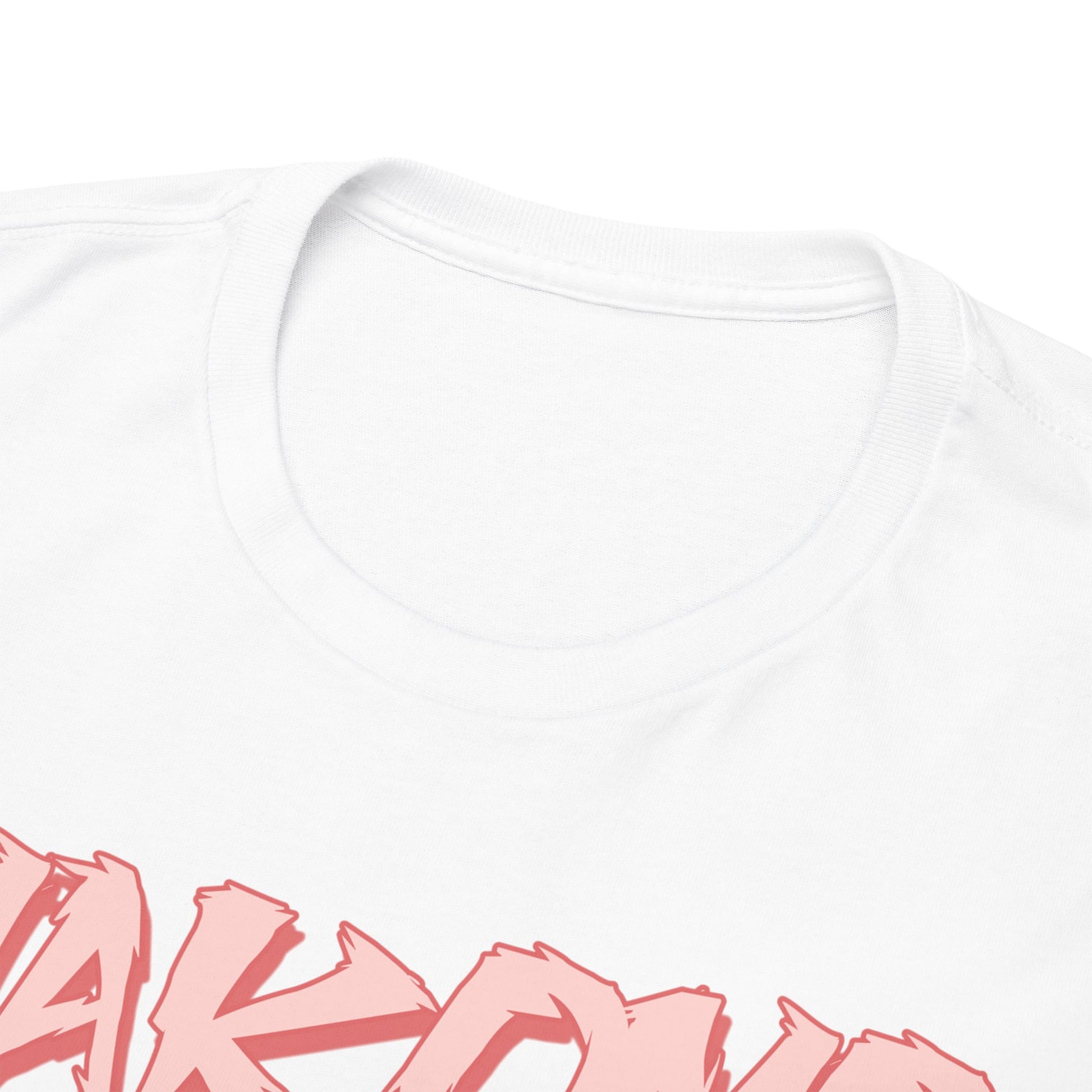 Close-up of the premium white Makomo Anime T-shirt, showcasing the intricate collar design and vibrant action-oriented artwork.