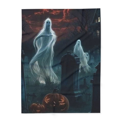 Decorative and Warm Halloween Spooky Arctic Fleece Blanket featuring ethereal ghosts and carved pumpkins in a haunting graveyard scene, adding a luxurious touch to your Halloween decor.