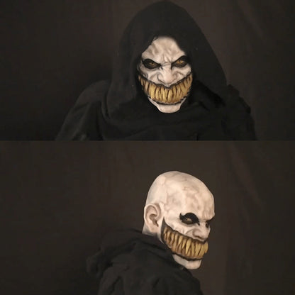 Premium Halloween Horror Latex Balaclava Mask displayed on a model, featuring an eerie design with exaggerated fangs and a sinister expression, perfect for Halloween parties and themed events.