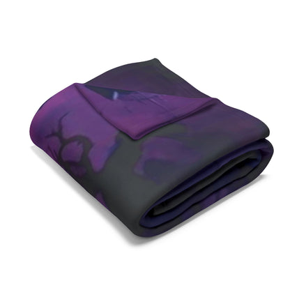 Luxurious Decorative and Warm Halloween Spooky Arctic Fleece Blanket elegantly folded, showcasing rich purple hues and a soft texture, perfect for adding a touch of seasonal charm to your home this Halloween.