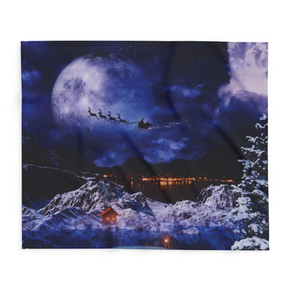 Beautifully displayed Decorative and Warm Christmas Arctic Fleece Blanket featuring a winter landscape with Santa's sleigh, ideal for adding charm to holiday celebrations.