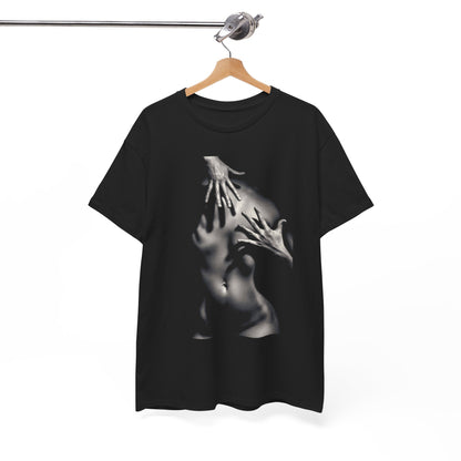 High-quality black t-shirt hanging elegantly, featuring an artistic print of hands on a nude shape, representing bold fashion sensibilities.
