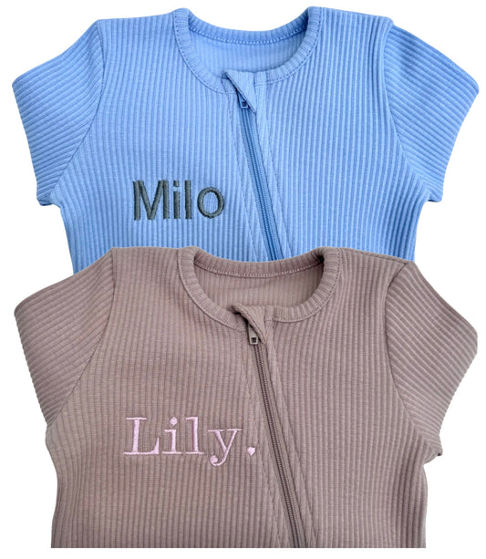 Luxury velvet mocha zip sleepsuit for babies from DreamBuy, featuring a soft skin-friendly design perfect for comfort and style.