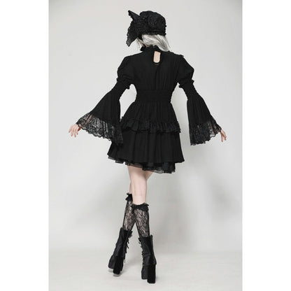 The Dark in Love Arya Gothic Doll Dress styled on a mannequin, demonstrating its elegant silhouette and luxurious textures for gothic fashion enthusiasts.