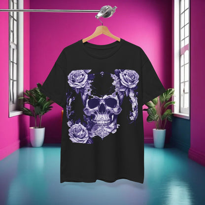 Skulls and Roses Cotton Tee displayed on a hanger in a vibrant pink room, highlighting the chic skull and rose design, ideal for modern fashion enthusiasts.