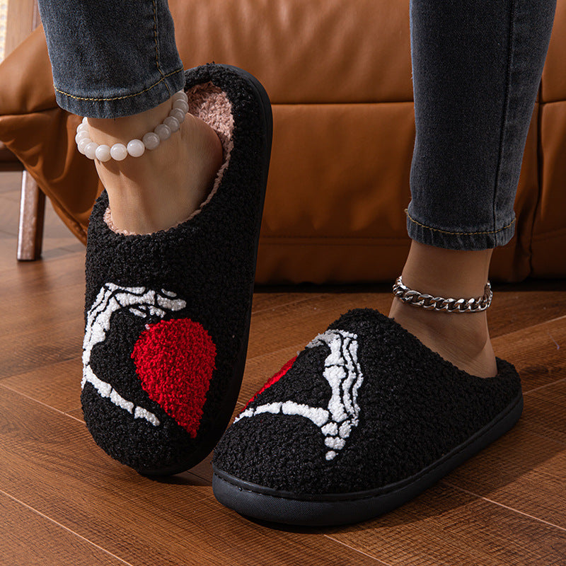 Luxurious Love Black Hand Thickened Cotton Slippers displayed from a side view, showcasing the elegant black texture adorned with artistic hand and heart details.