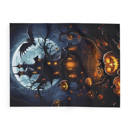 Luxurious Decorative and Warm Halloween Spooky Arctic Fleece Blanket featuring an intricate design of a haunted house under a full moon, perfect for autumn decor.