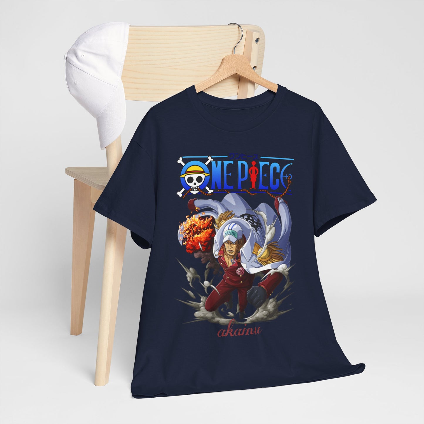 Chic One Piece Akainu t-shirt displayed on a modern chair, complemented by a stylish cap, capturing a fashionable and trendy look for anime lovers.
