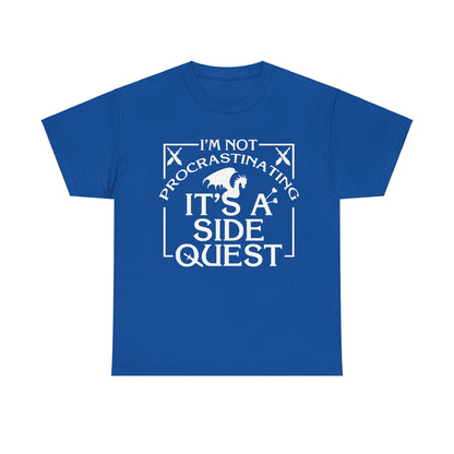 Luxury Unisex Graphic Tee: "It's A Side Quest" presented in a vibrant blue shade, with a prominent white graphic featuring the words 'I'M NOT PROCRASTINATING, IT'S A SIDE QUEST' alongside a dragon illustration.