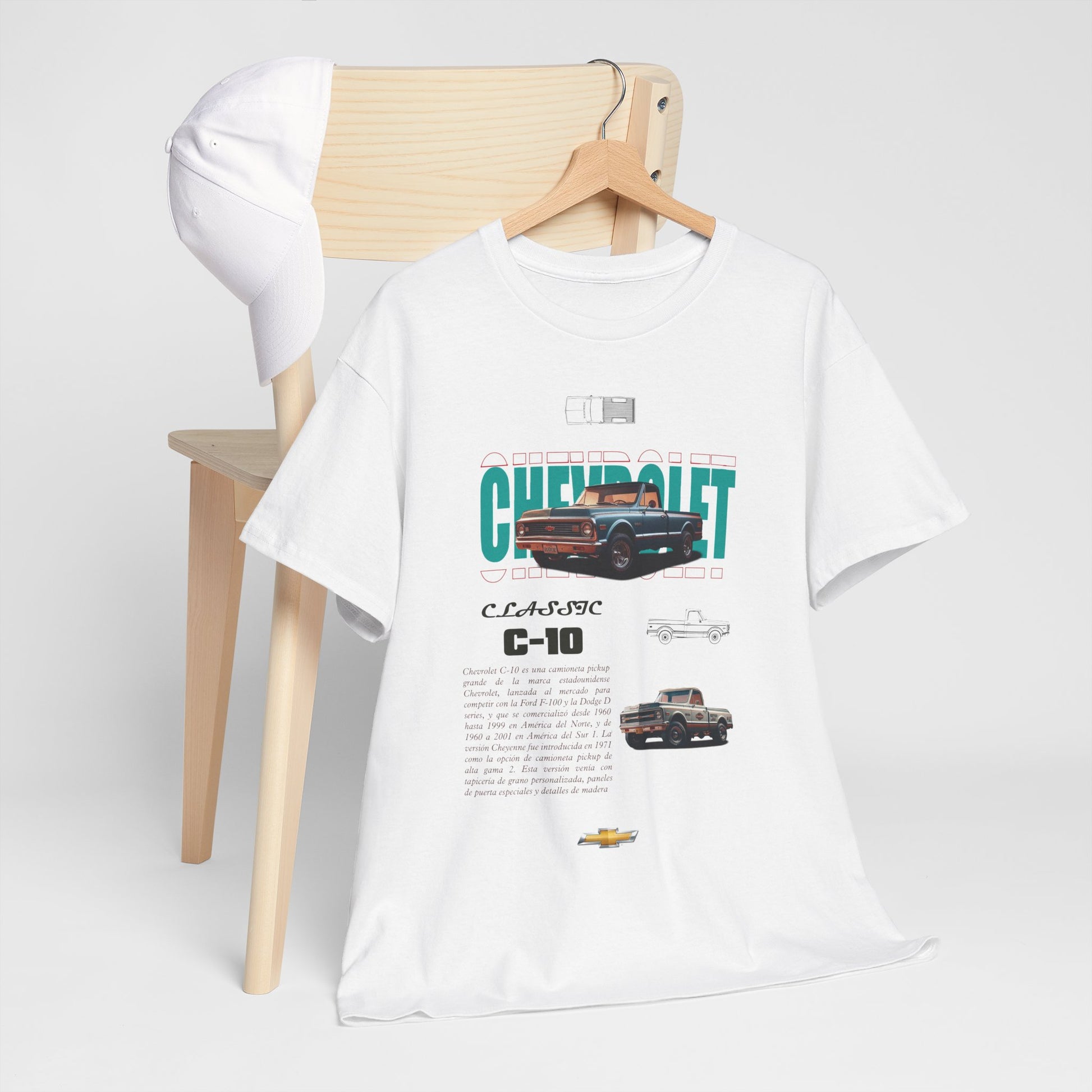 Chic Chevrolet C-10 Classic T-shirt resting on a wooden chair, paired with a cap, embodying a fashionable yet relaxed aesthetic.