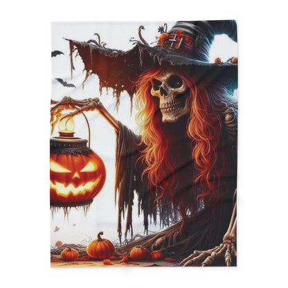 Sophisticated Decorative and Warm Halloween Spooky Arctic Fleece Blanket with a striking image of a witch's skeleton and a jack-o'-lantern, designed to enhance your Halloween aesthetic.