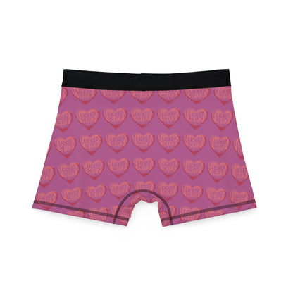 Back view of Valentine's Naughty Cheeky Men's Boxer Briefs showcasing vibrant heart pattern and cheeky message for a fun and flirty style.