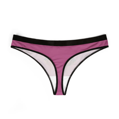 Elegant pink women's thong underwear featuring sleek black trim, designed for a playful and romantic flair.