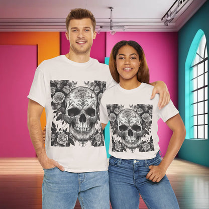 Two models wearing the Skulls and Roses Cotton Tee, demonstrating its unisex appeal and striking graphic design in a stylish indoor setting.