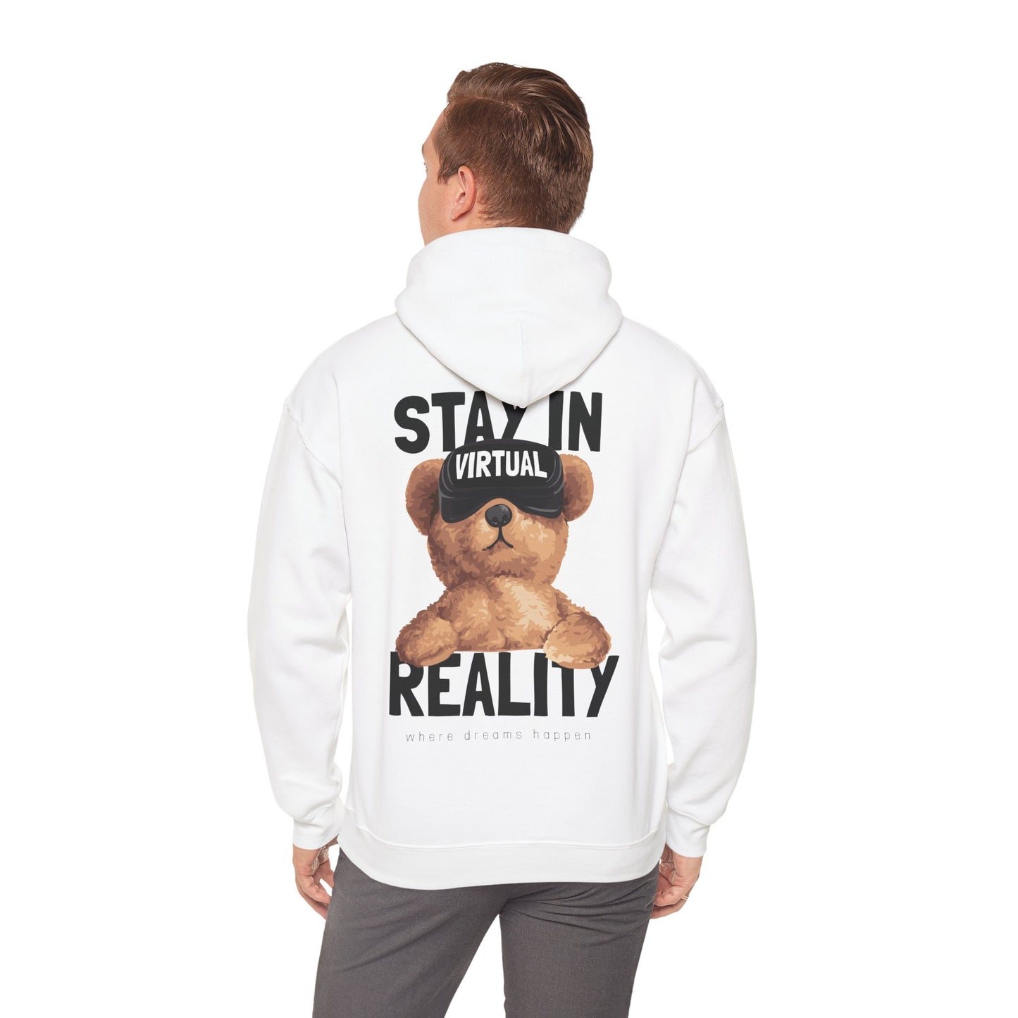 Stylish white hoodie adorned with an endearing teddy bear in VR goggles, modelled by a fashionable man, emphasizing casual elegance and playful fashion.