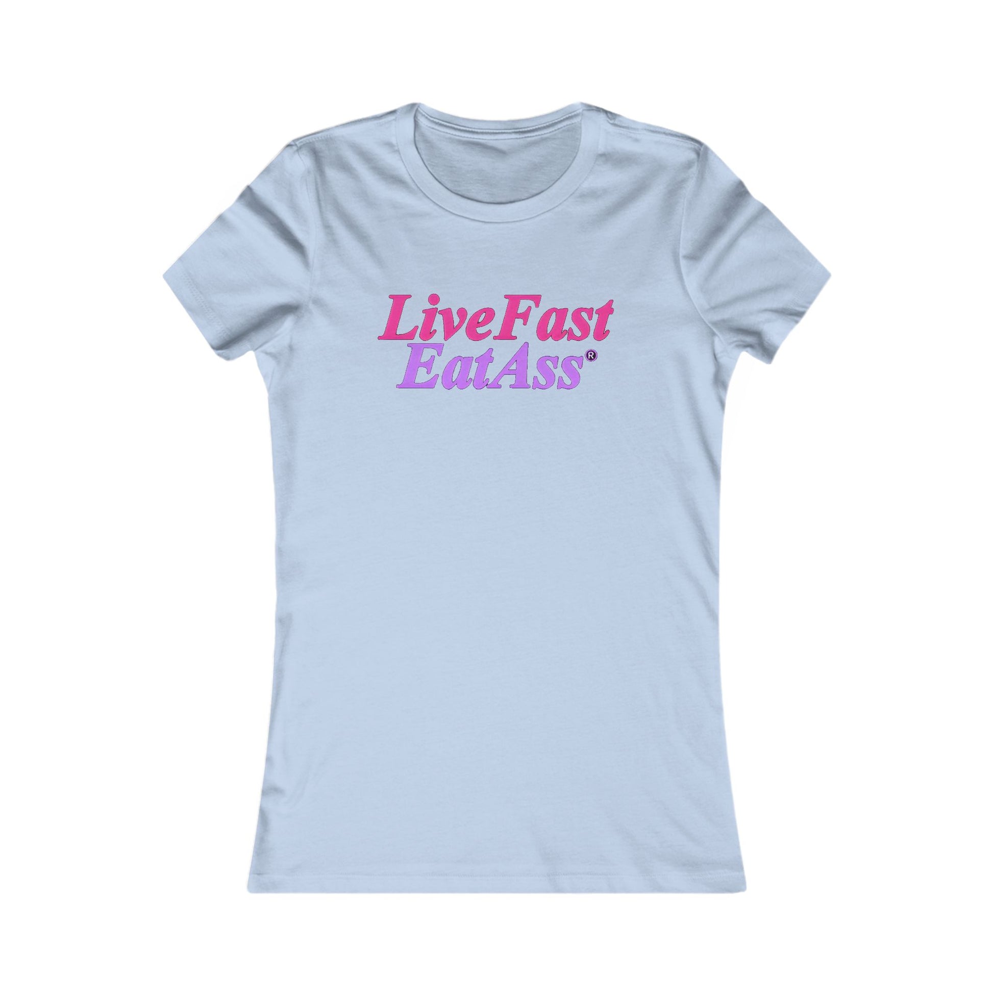 Charming light blue fitted t-shirt for women, displaying the eye-catching slogan 'Live Fast, Eat Ass®' in an elegant pink and purple gradient, perfect for a relaxed yet fashionable look.
