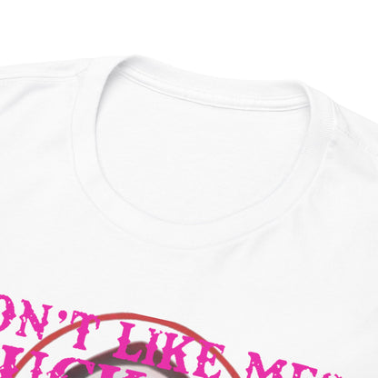 Close-up view of the neckline of a luxurious men's T-shirt featuring a bold printed message in vibrant pink lettering.