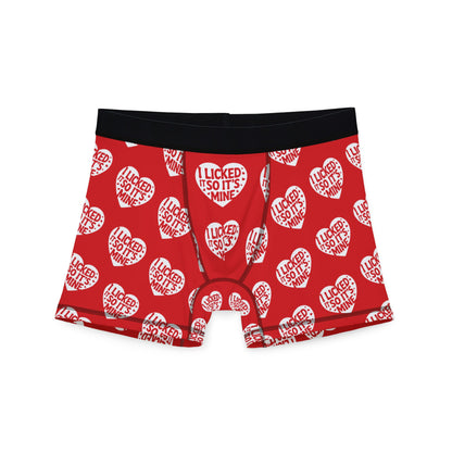 Valentine's Naughty Cheeky Men's Boxer Briefs with a playful heart design and the bold phrase 'I LICKED IT SO IT'S MINE' in white text, perfect for adding a humorous touch to romantic occasions.