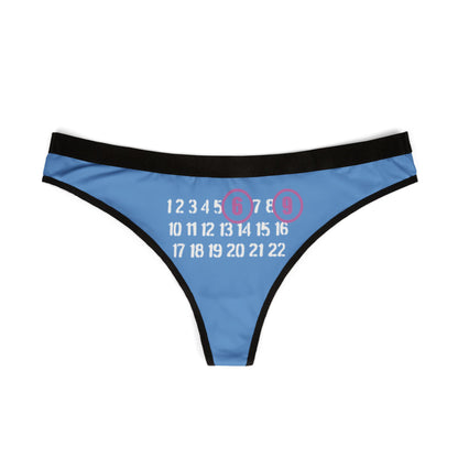 Stylish blue thong with a bold '69' graphic prominently displayed, accentuated by pinkish-purple circles, showcasing a blend of playful charm and elegant design for modern lingerie.