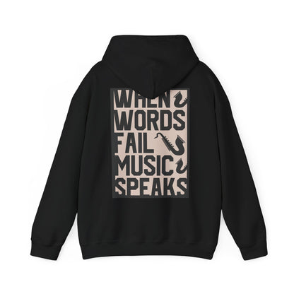 Luxurious back view of a stylish black hoodie showcasing the bold quote 'WHEN WORDS FAIL MUSIC SPEAKS' alongside elegant saxophone designs, perfect for music lovers.