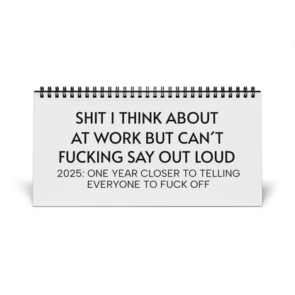 2025 Humorous Desktop Calendar for Work with Cheeky Quotes featuring a witty phrase: 'SHIT I THINK ABOUT AT WORK BUT CAN’T FUCKING SAY OUT LOUD' and a humorous year-end reminder, perfect gift for colleagues.