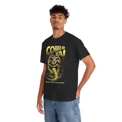 Stylish black Cobra Kai T-shirt featuring a bold graphic design of a coiled snake and striking text. Ideal for martial arts enthusiasts, this unisex tee combines humour with nostalgia.
