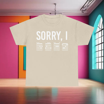 Elevate your style with the Sorry I DGAF Graphic T-Shirt, featuring a chic design of musical chord graphics on a light background, perfect for music lovers.