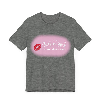 Sabrina Carpenter Inspired Unisex Short Sleeve Tee featuring a colourful lips print on a chic grey fabric, a statement piece for fashion lovers.