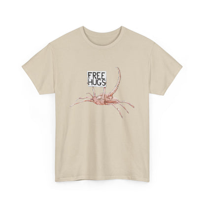 Front view of the Alien Xenomorph Facehugger Free Hugs Unisex Graphic Cotton Funny T Shirt in elegant beige, featuring a whimsical facehugger graphic holding a 'Free Hugs' sign.