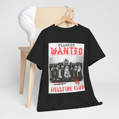 Stylish black T-shirt draped over a wooden chair, showcasing a captivating 'Players Wanted' print influenced by the Hellfire Club theme, complemented by a white cap.