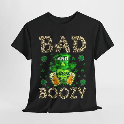 Elegant Bad And Boozy St. Patrick's Day T-Shirt featuring a striking leopard print design with bold 'BAD AND BOOZY' lettering, adorned with a green leprechaun hat and festive shamrocks.