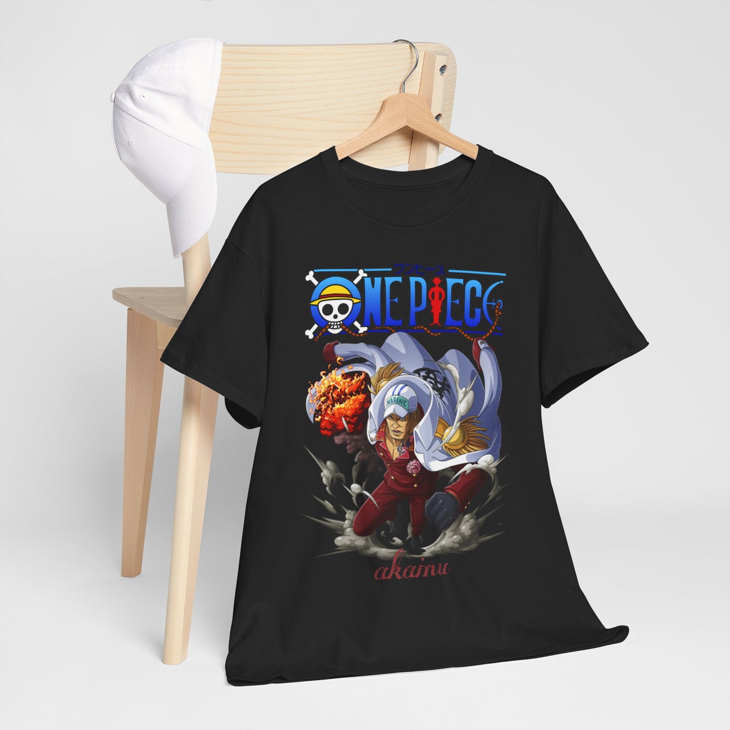 Chic One Piece Akainu t-shirt artistically arranged on a wooden chair, accentuated by a stylish cap, embodying luxury streetwear.