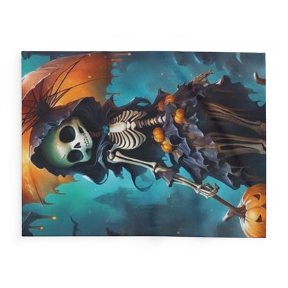 Decorative and Warm Halloween Spooky Arctic Fleece Blanket showcasing a stylish skeleton character, accessorised with pumpkins and an umbrella, perfect for autumn decor.