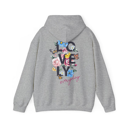 Elegant grey hoodie featuring vibrant floral artwork and bold typography design, ideal for a stylish casual look.