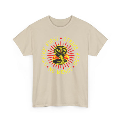 Stylish unisex t-shirt displaying the Cobra Kai emblem with bold graphics and the motto 'Strike First, Strike Hard, No Mercy,' perfect for vibrant casual wear.