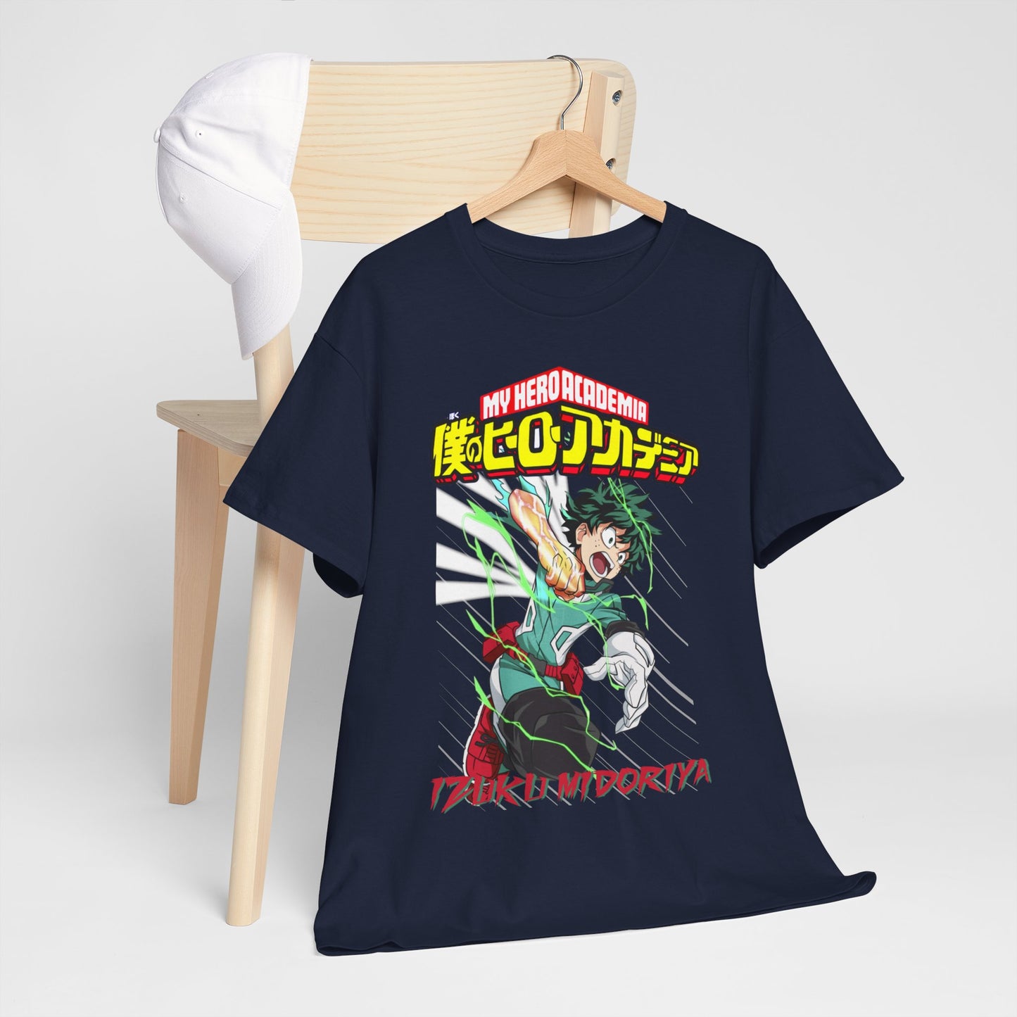 Chic My Hero Academia Izuku Midoriya T-shirt displayed casually on a chair with a stylish cap, presenting a trendy and fashionable look.