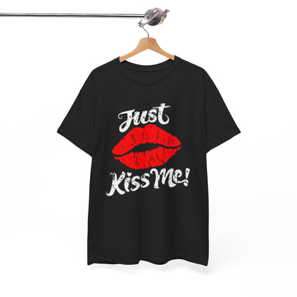 Stylish black cotton t-shirt showcased on a hanger, showcasing a vibrant graphic of red lips with the flirty phrase 'Just Kiss Me!' for a sophisticated casual look.