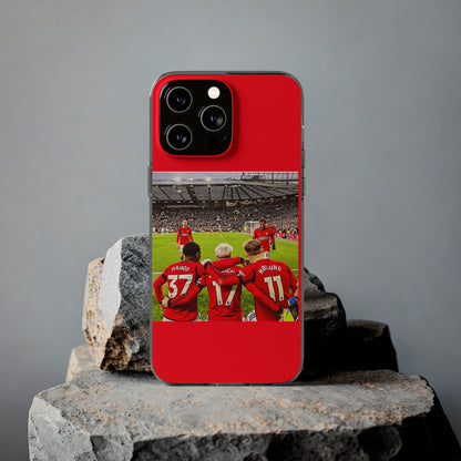 Chic Manchester United Mainoo Garnach Hojlund Soft Phone Case capturing a celebrated scene of player unity, tailored for discerning soccer fans.
