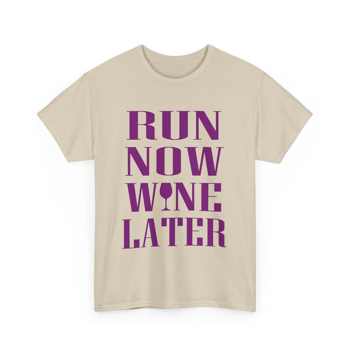 Stylish women's t-shirt showcasing the motivational phrase 'RUN NOW WINE LATER' in bold purple lettering, complemented with a wine glass graphic, perfect for fitness lovers.