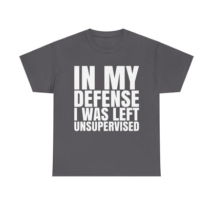 In My Defense Graphic Tee Shirt in grey featuring bold typography stating 'IN MY DEFENSE I WAS LEFT UNSUPERVISED', designed for comfort and style, ideal for geeks.