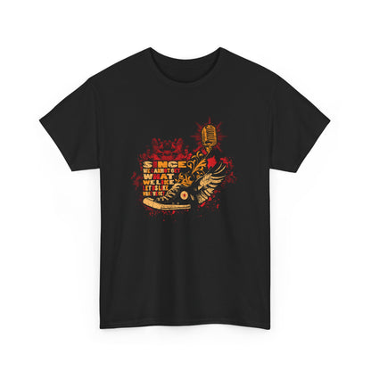 Chic black grunge-inspired men's t-shirt front view, featuring a bold artistic graphic of sneakers and a vintage microphone, complemented by the philosophical phrase 'SINCE WE CANNOT GET WHAT WE LIKE; LET US LIKE WHAT WE GET' in eye-catching hues.