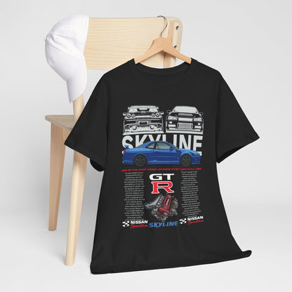 Sophisticated arrangement of a black Nissan Skyline GT-R T-shirt and white cap on a wooden chair, highlighting the detailed artwork and technical insights of the iconic vehicle.