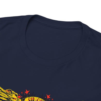 Close-up view of a navy blue t-shirt's neckline, featuring a prominent yellow skull graphic with intricate floral and wing designs, highlighting luxury and artistic expression.