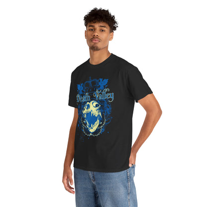 A stylish young man wearing a black t-shirt with a captivating blue skull graphic and ornamental crown, embodying gothic elegance.