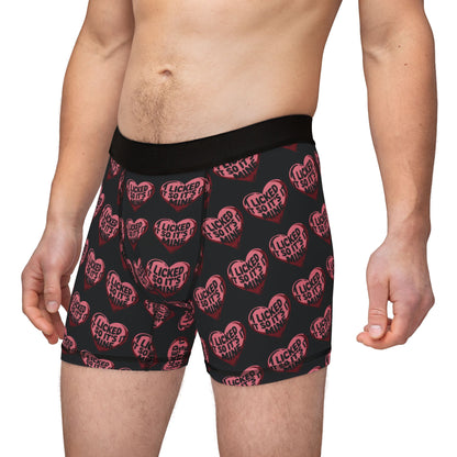Model wearing Valentine's Naughty Cheeky Men's Boxer Briefs, highlighting the playful heart design and comfortable fit ideal for romantic occasions.